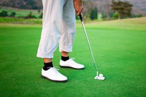 Golfer getting ready to hit the golf ball